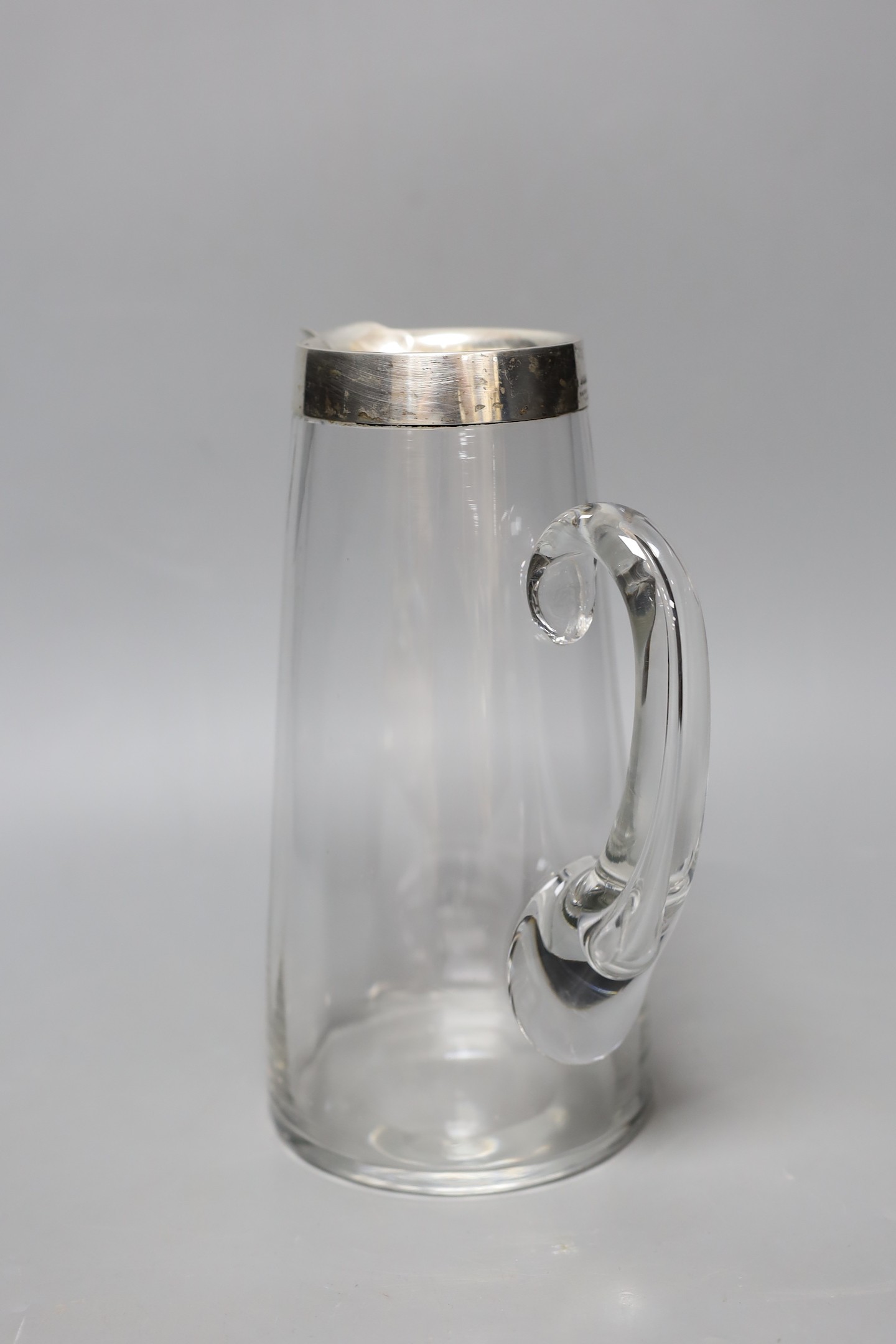 An early 20th century Asprey silver mounted glass jug. 24.5cm tall